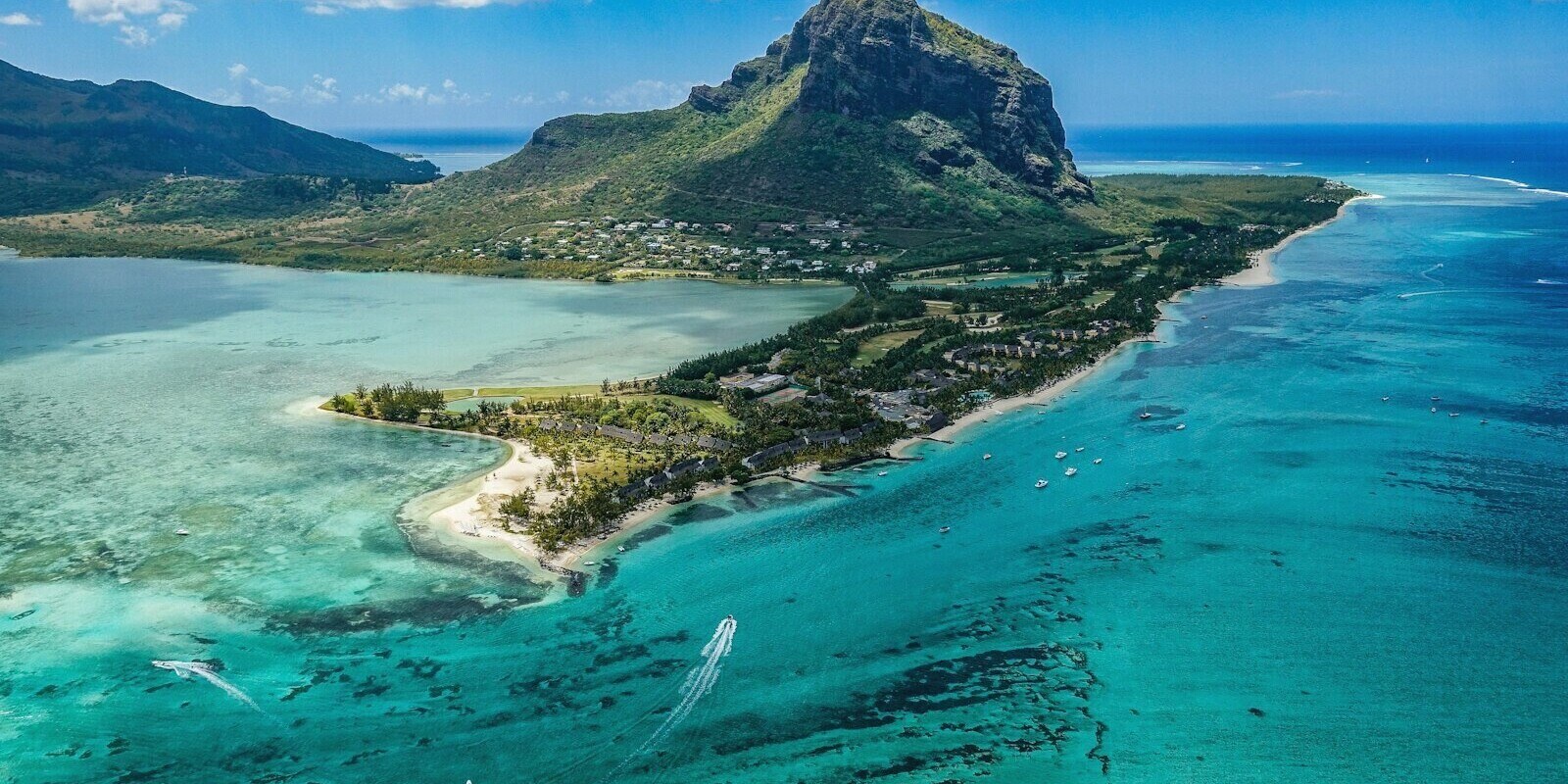 Le Morne Brabant from the air — the mountain, its peninsula and the turquoise lagoon around it
